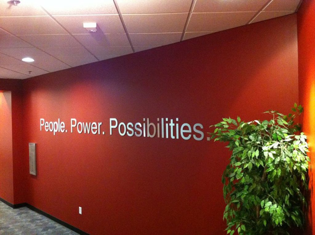 Interior signs on wall installed by Priority Signs & Graphics in Fort Worth, TX