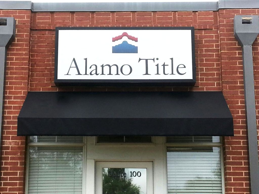 Alamo Title box building sign installed by Priority Signs & Graphics in Dallas Fort Worth