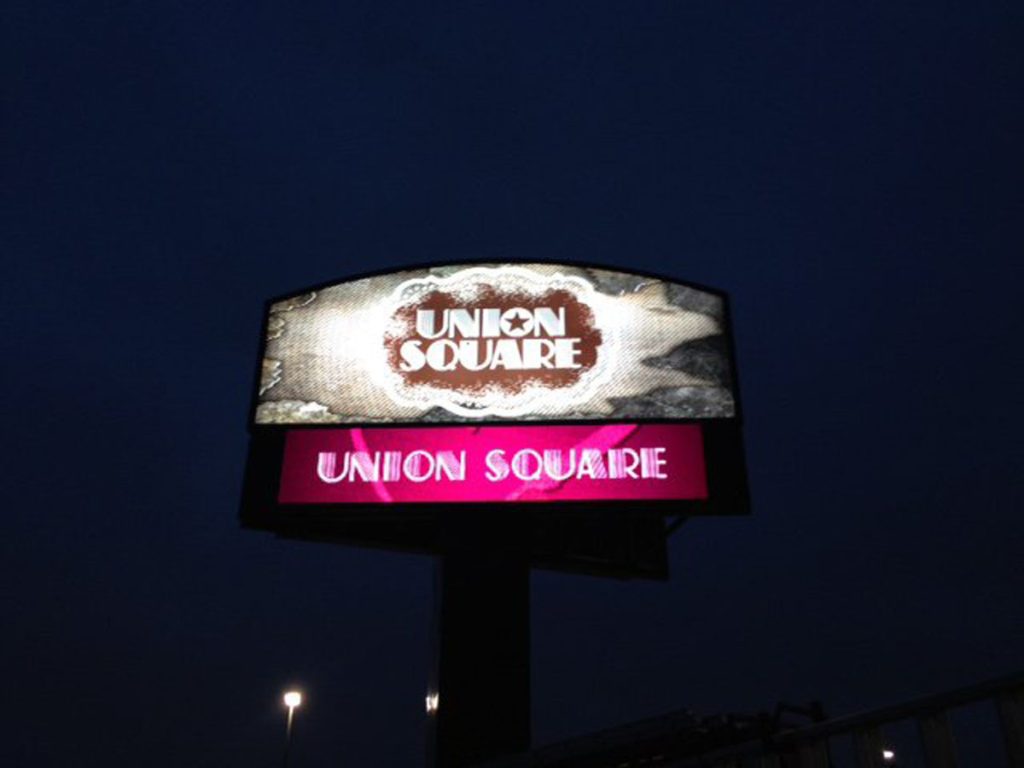 Lighted post and panel sign Union Square made by Priority Signs & Graphics in Dallas