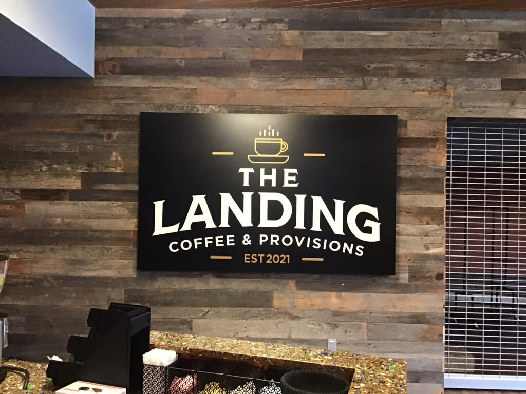 Vinyl sign for Landing Coffee made by Sign Company in Dallas, TX