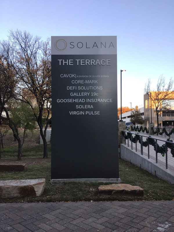 Large pylon sign for Solana business installed in Dallas, Texas