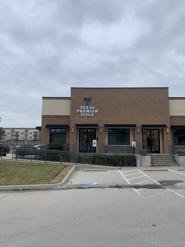 Storefront building sign of Texas Premier Title 