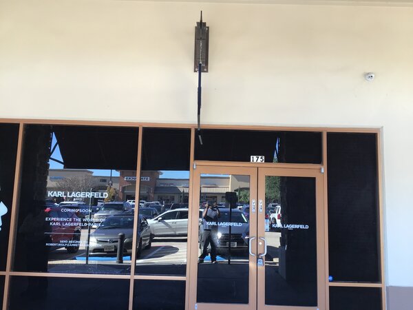 Storefront window graphics for business installed in Dallas, TX