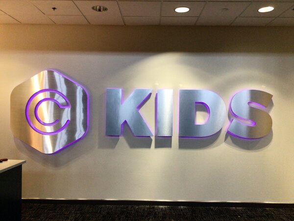 lighted office sign of Kids